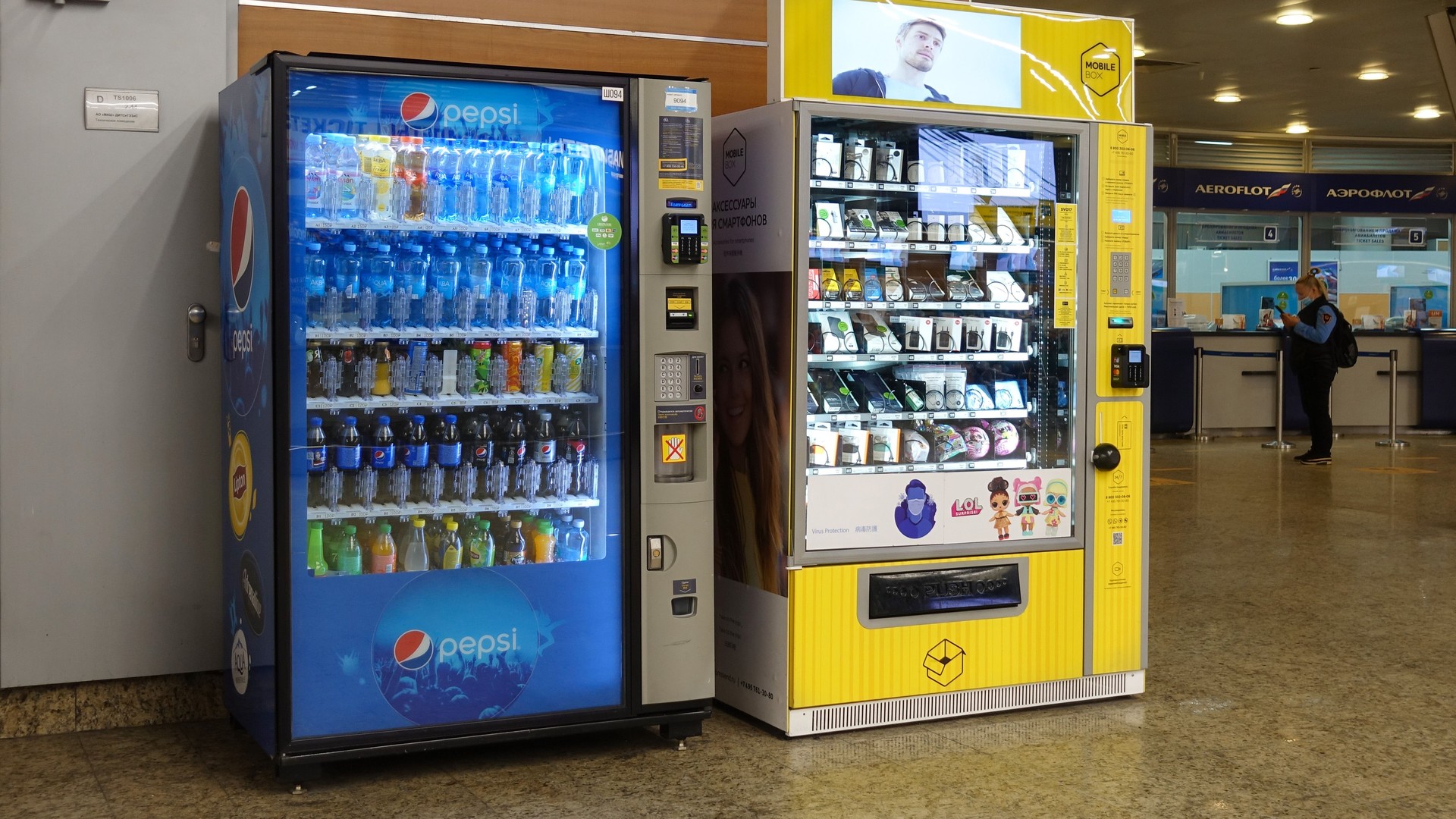 Vending machines for drinks and mobile accessories at the airport. Russia Moscow